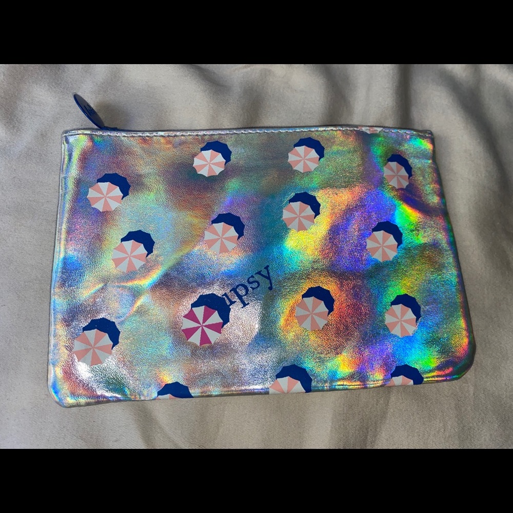 silver makeup bag with candy print